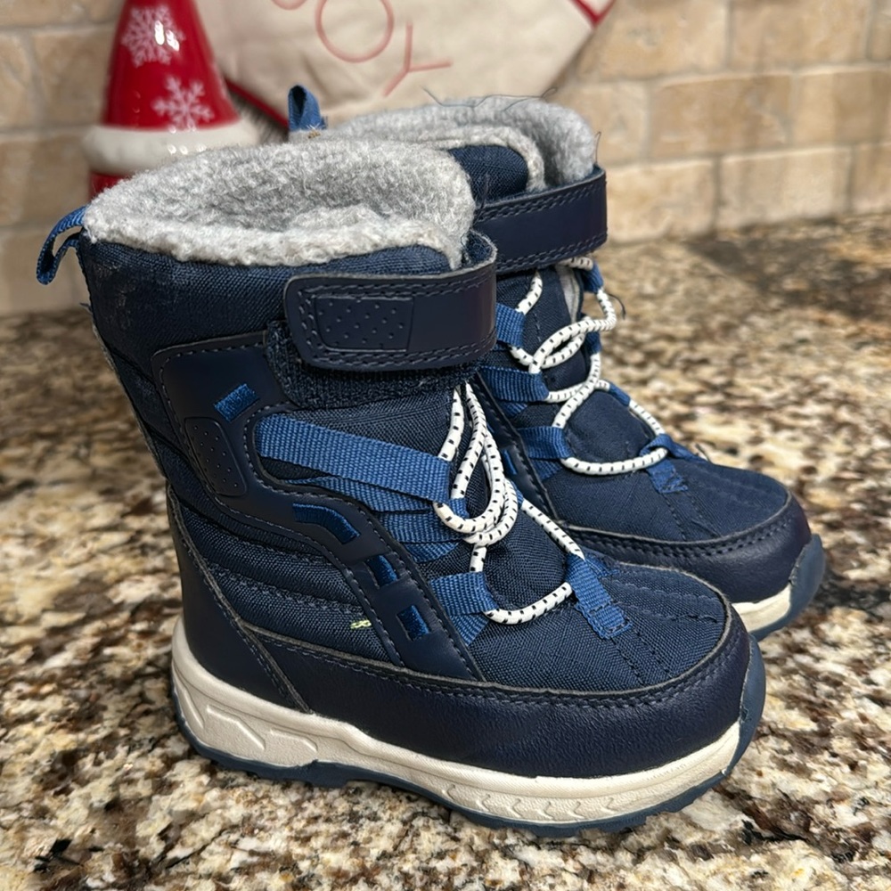 Toddler size 7 Carter boots